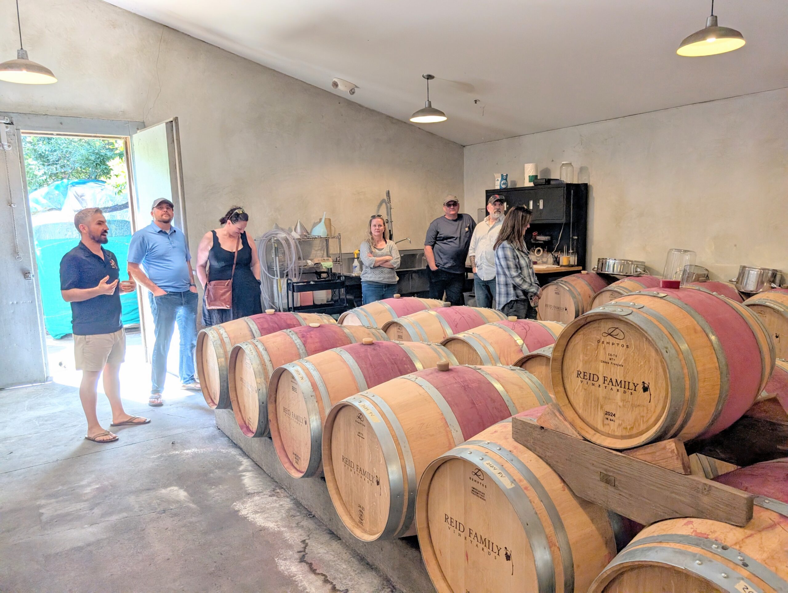 My guests getting a tour of the barrel room!